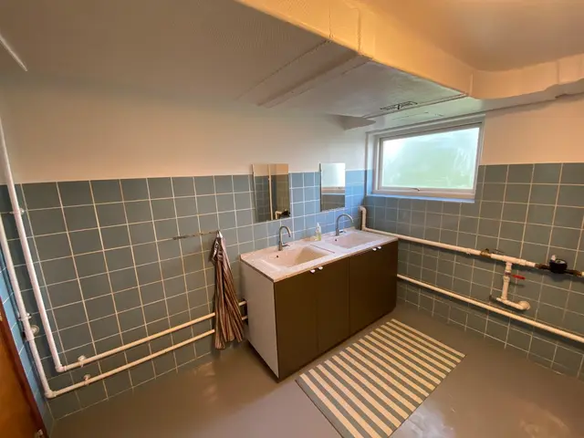 Toilet med håndvask